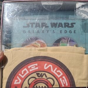 Star Wars Galaxy's Edge Collectible with Red and Tan Design